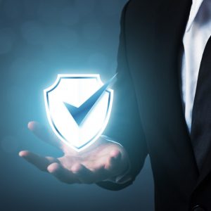 businessman-holding-shield-protect-icon